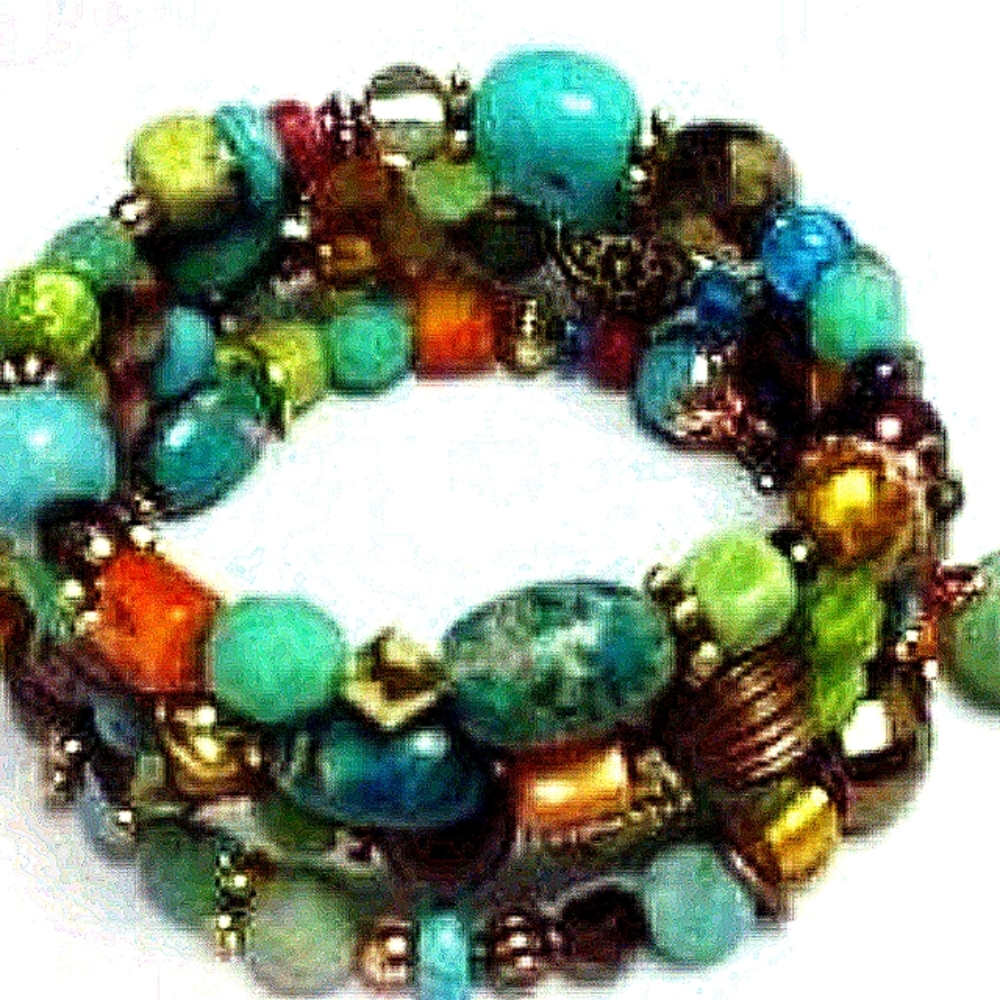 Bracelets of real gemstones that are wire-wrapped.